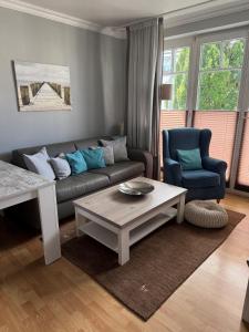 Posezení v ubytování Haus Jahreszeiten Appartement Meeresrauscher by Unsere Urlaubszeit