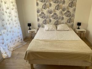 Ένα ή περισσότερα κρεβάτια σε δωμάτιο στο Appartement à la campagne