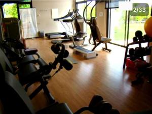a gym with several exercise equipment in a room at Villa Eden Dyar Shemsi L'Orangeraie Agadir in Taroudant