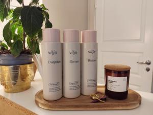 a group of four products sitting on a counter at Førde sentrum - Lindbøen Gjesterom in Førde