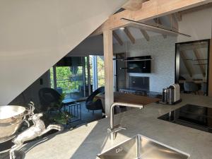 a kitchen and dining area of a house at Gästehaus Huber in Immenstaad am Bodensee