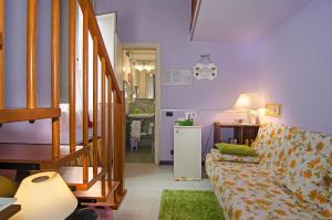 Postel nebo postele na pokoji v ubytování Hotel Rex