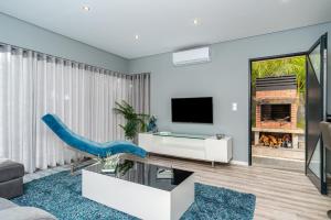 TV a/nebo společenská místnost v ubytování Casa Mariana by Rent2U, Lda