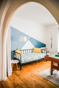 Postel nebo postele na pokoji v ubytování Grand Logement Cosy Résidence des Romains