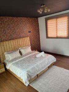 Postel nebo postele na pokoji v ubytování Studio cozy Mermoz