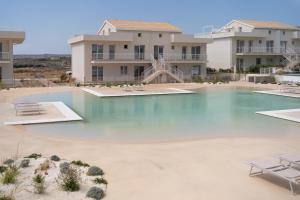 Swimmingpoolen hos eller tæt på GuestHost - Borgo 84 Marzamemi - Brezza Marina