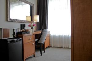 Kuchyň nebo kuchyňský kout v ubytování Hotel Rialto