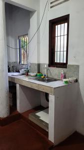 Kuchyň nebo kuchyňský kout v ubytování EECS Transit and Budget Homestay