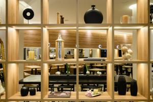 a dining room with a table and a mirror at Midtown Boutique Hotel in Buenos Aires +40 photos