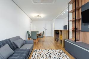 TV a/nebo společenská místnost v ubytování Residencial Vêneto 1 dorm Achei Gramado