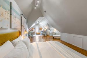 a white room with a bed and a living room at ARIA at Azul Mansion Key West in Key West +26 photos