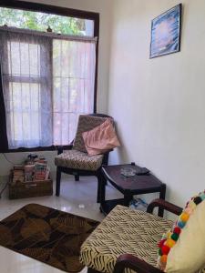 Khu vực ghế ngồi tại Lake Villa Goyambokka