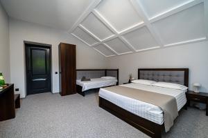 Postelja oz. postelje v sobi nastanitve Villa Caza + 32 fotografij