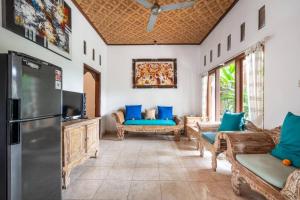 Μια τηλεόραση ή/και κέντρο ψυχαγωγίας στο salaoni villa ubud