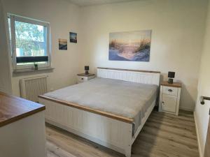 Ένα ή περισσότερα κρεβάτια σε δωμάτιο στο Ferienhaus Zecherin