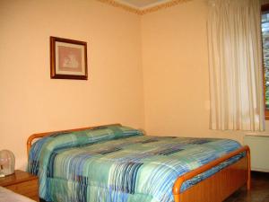 Postel nebo postele na pokoji v ubytování Hotel Ristorante Fiorelli