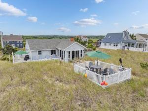 a view of a house from the top of a hill at 277 Phillips Road Sandwich - Cape Cod in Sagamore Beach
