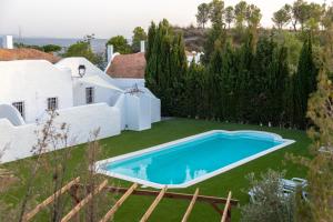 Πισίνα στο ή κοντά στο Complejo Rural Reflejo del Negratín