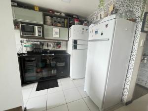 Dapur atau dapur kecil di Edifício Nahum Residence