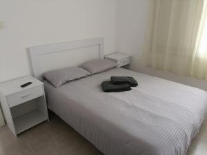 Кровать или кровати в номере Uni Comfort