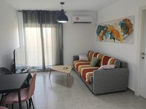 Гостиная зона в Uni Comfort