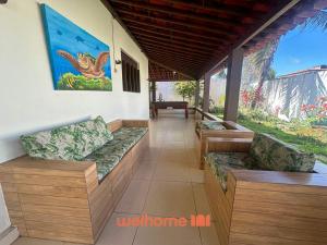 Ruang duduk di Casa em Natal com piscina 4min da praia