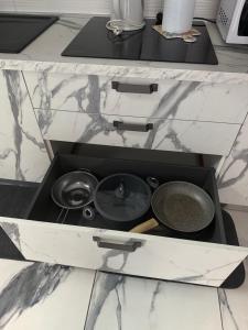 Η κουζίνα ή μικρή κουζίνα στο Naomi Luxury Home