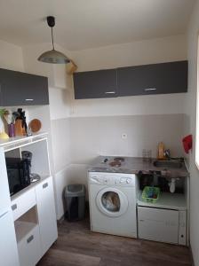 Η κουζίνα ή μικρή κουζίνα στο Charmant appartement