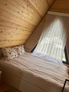 Postel nebo postele na pokoji v ubytování Paradise