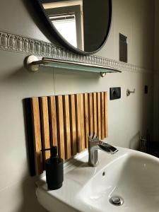 Koupelna v ubytování Komandorska Apartments + 33 fotografií