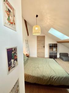 En eller flere senge i et værelse på La Petite Maison