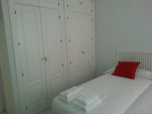 Posteľ alebo postele v izbe v ubytovaní Apartamento Buhaira