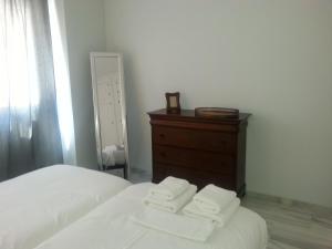 Posteľ alebo postele v izbe v ubytovaní Apartamento Buhaira