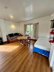 Ένα ή περισσότερα κρεβάτια σε δωμάτιο στο Skyblue Apart Hotel Punta Colorada