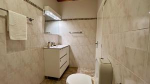 Koupelna v ubytování Domingos Reis