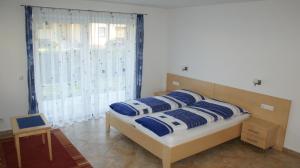 Postel nebo postele na pokoji v ubytování Ferienhaus Wieser