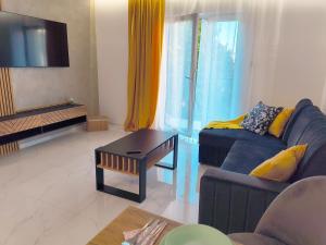 Ruang duduk di Aura Apartamenty 2