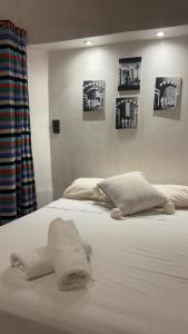 En eller flere senge i et værelse på Essaouira wood studio medina