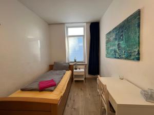 เตียงในห้องที่ Havenwelten Apartment +9 ภาพ