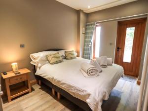 Voodi või voodid majutusasutuse Abbots Reading Cottage toas