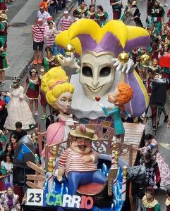 a float in a carnival parade with a mask at Domus Redes in Pola de Laviana +26 photos