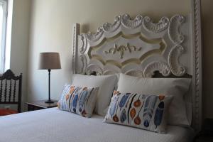 Postel nebo postele na pokoji v ubytování Hotel Vila Esteves