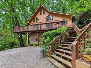 a home with a staircase leading up to a house at Top of the Line Asheville Mountain Cabin in Leicester