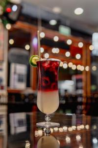 a drink with a lime on a table at Departamento Cielo in Puerto Vallarta