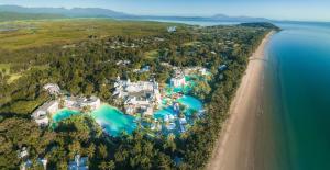 an aerial view of a resort next to the beach at Mirage Resort Villa 438 with access to Sheraton Facilities in Port Douglas +2 photos
