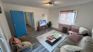 Televisyen dan/atau pusat hiburan di Ferienhaus in Lambsheim- "familienfreundlich" und PlayStation-FIFA