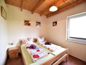 Ένα ή περισσότερα κρεβάτια σε δωμάτιο στο Klaus