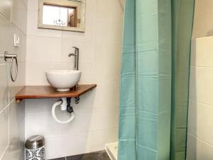 a bathroom with a sink and a shower at Oleandre in Cassagnolles +34 photos