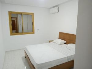Ένα ή περισσότερα κρεβάτια σε δωμάτιο στο Dar loujeyne