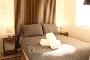 Кровать или кровати в номере Departamento Central Copiapo, 6 personas, 3 habitaciónes Disegni 09 +15 фотографий